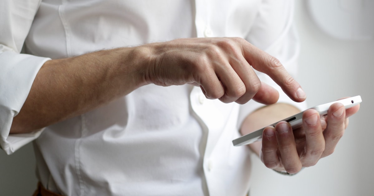 Man interacting with phone