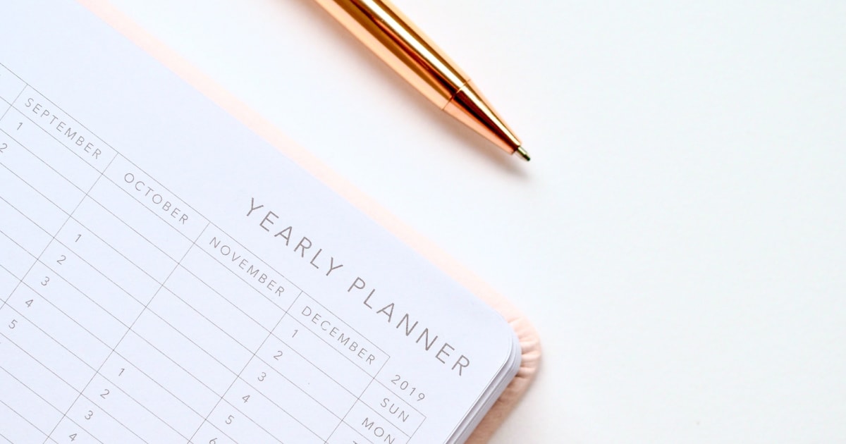 Yearly planner with pen