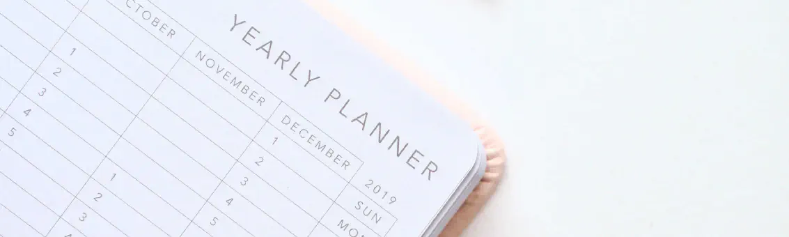 Planificador anual con bolígrafo